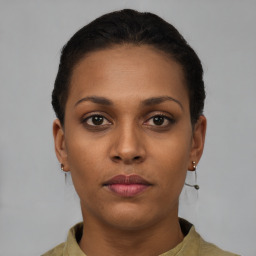 Neutral black young-adult female with short  brown hair and brown eyes