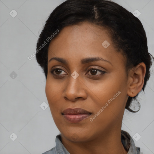 Joyful black young-adult female with medium  black hair and brown eyes