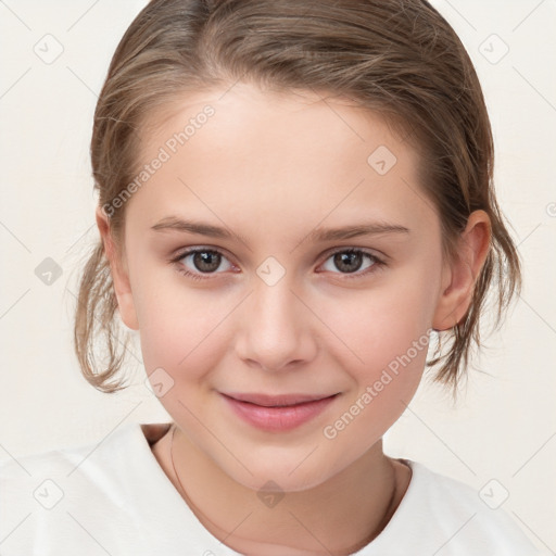 Joyful white child female with medium  brown hair and brown eyes