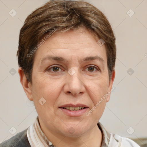 Joyful white adult female with short  brown hair and grey eyes