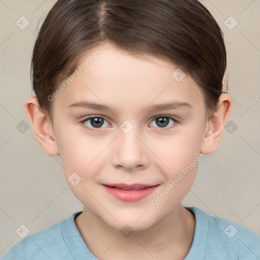 Joyful white child female with short  brown hair and brown eyes