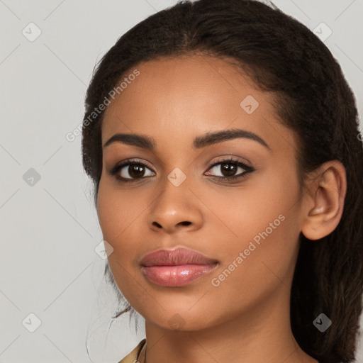 Joyful latino young-adult female with long  brown hair and brown eyes