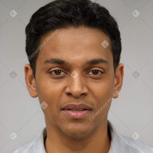 Joyful latino young-adult male with short  black hair and brown eyes