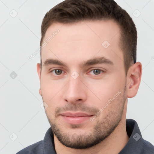 Neutral white young-adult male with short  brown hair and grey eyes