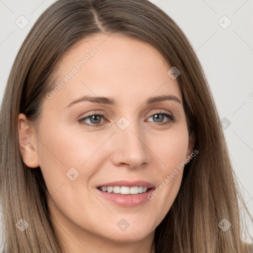 Joyful white young-adult female with long  brown hair and grey eyes