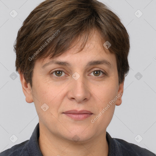 Joyful white adult female with short  brown hair and brown eyes