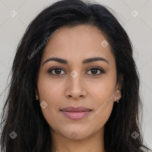 Joyful latino young-adult female with long  brown hair and brown eyes