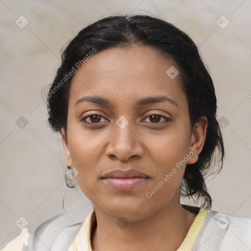 Joyful latino young-adult female with medium  black hair and brown eyes