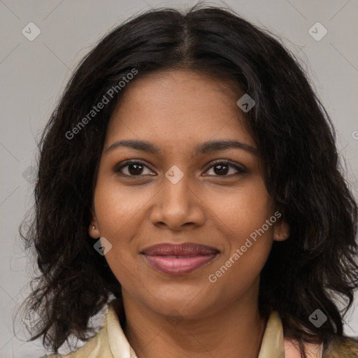 Joyful black young-adult female with medium  brown hair and brown eyes