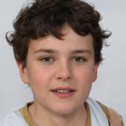 Joyful white child male with short  brown hair and brown eyes