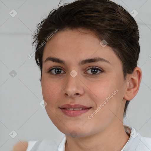 Joyful white young-adult female with short  brown hair and brown eyes