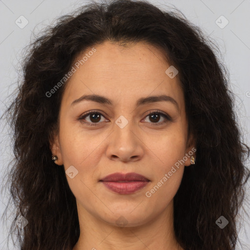 Joyful white adult female with long  brown hair and brown eyes