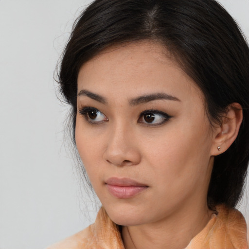 Neutral asian young-adult female with long  brown hair and brown eyes