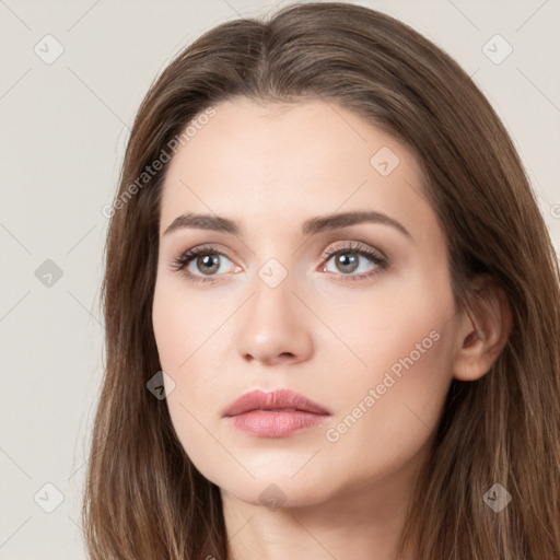 Neutral white young-adult female with long  brown hair and brown eyes