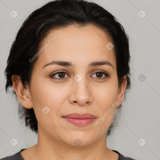 Joyful latino young-adult female with medium  brown hair and brown eyes