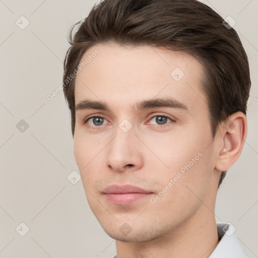 Neutral white young-adult male with short  brown hair and grey eyes