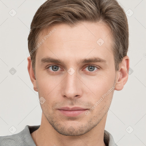 Neutral white young-adult male with short  brown hair and grey eyes