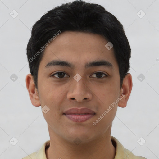 Joyful asian young-adult male with short  black hair and brown eyes