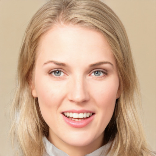 Joyful white young-adult female with medium  brown hair and blue eyes