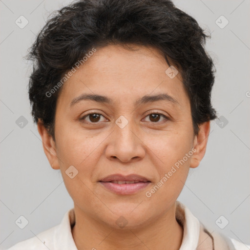 Joyful white adult female with short  brown hair and brown eyes