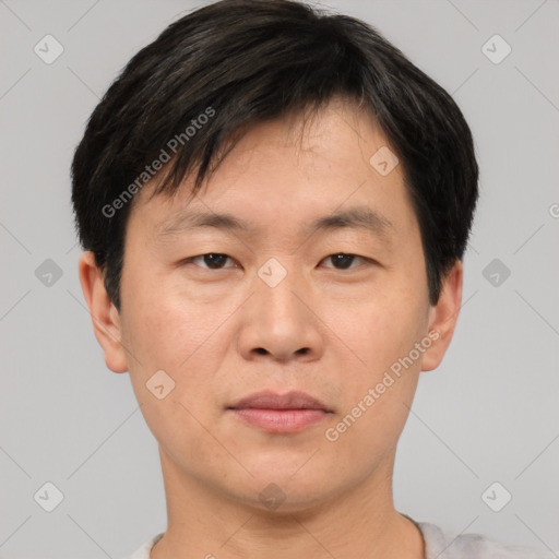 Neutral asian young-adult male with short  brown hair and brown eyes