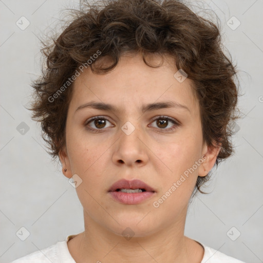 Neutral white young-adult female with short  brown hair and brown eyes