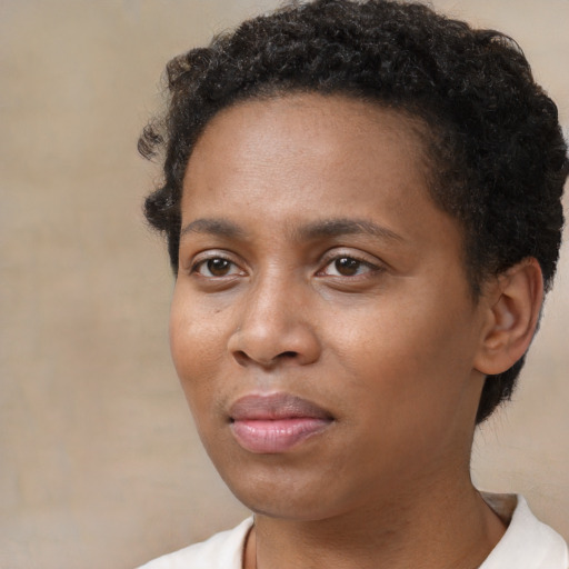 Neutral black young-adult female with short  brown hair and brown eyes