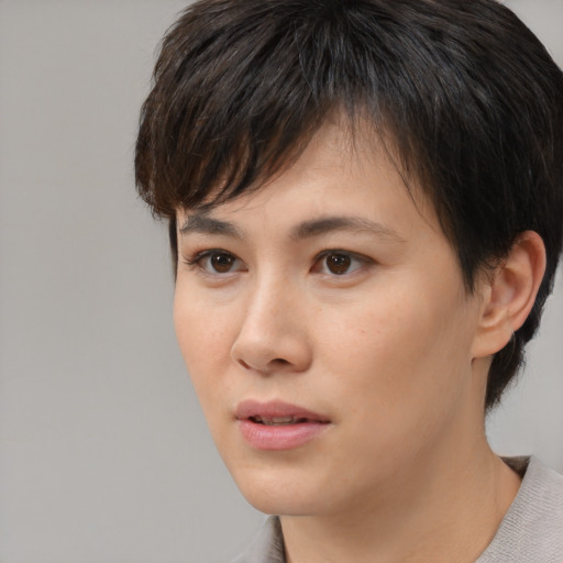 Neutral white young-adult female with short  brown hair and brown eyes