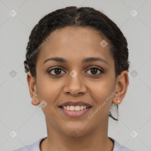 Joyful latino young-adult female with short  brown hair and brown eyes