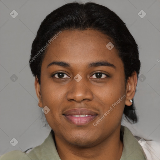 Joyful black young-adult female with short  black hair and brown eyes