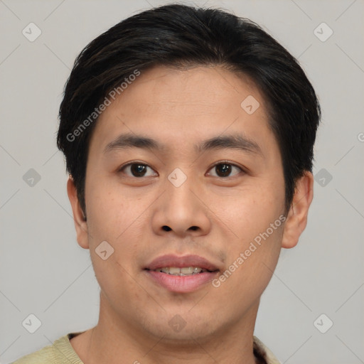 Joyful asian young-adult male with short  brown hair and brown eyes