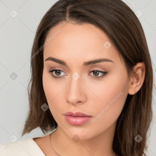 Neutral white young-adult female with long  brown hair and brown eyes