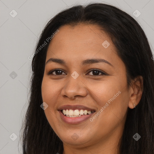 Joyful asian young-adult female with long  brown hair and brown eyes