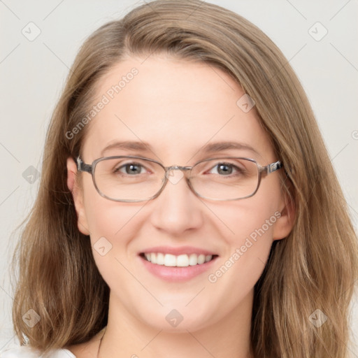 Joyful white adult female with medium  brown hair and grey eyes