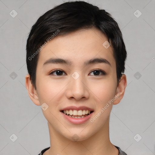 Joyful asian young-adult female with short  black hair and brown eyes