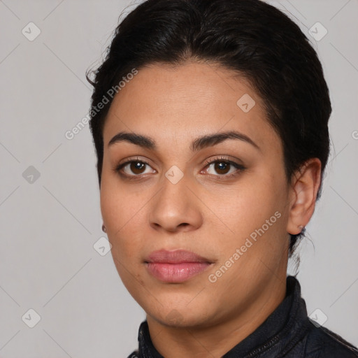 Joyful latino young-adult female with short  black hair and brown eyes