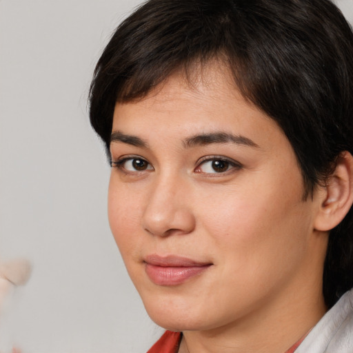Neutral white young-adult female with short  brown hair and brown eyes