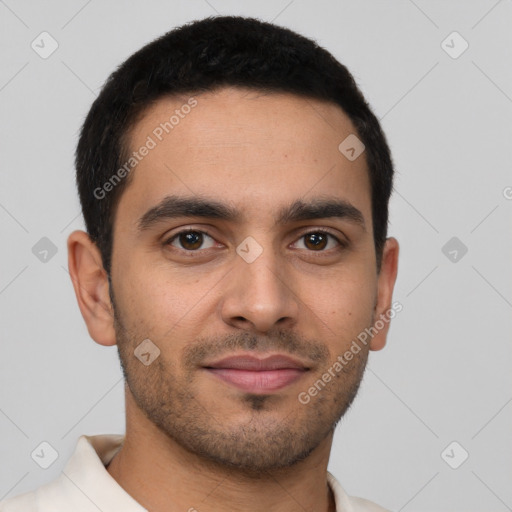 Joyful latino young-adult male with short  brown hair and brown eyes