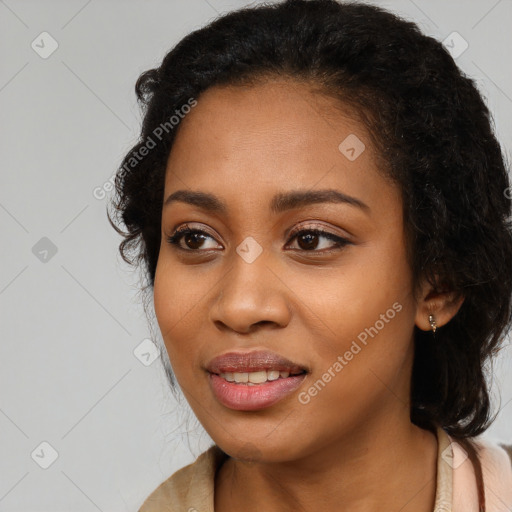 Joyful latino young-adult female with long  black hair and brown eyes