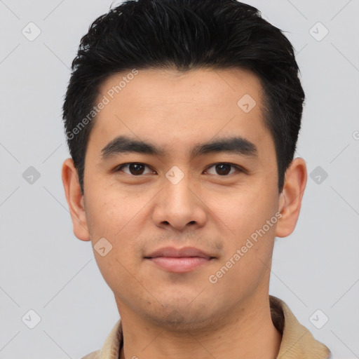 Joyful asian young-adult male with short  black hair and brown eyes