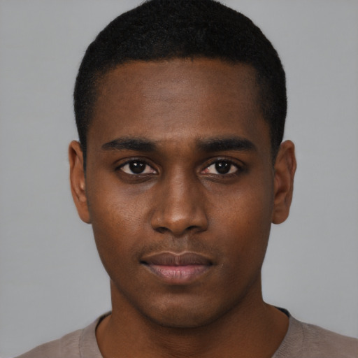 Neutral black young-adult male with short  black hair and brown eyes