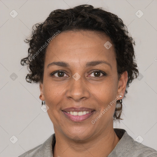 Joyful white adult female with short  brown hair and brown eyes