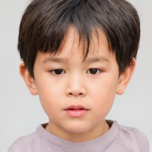 Neutral asian child male with short  brown hair and brown eyes