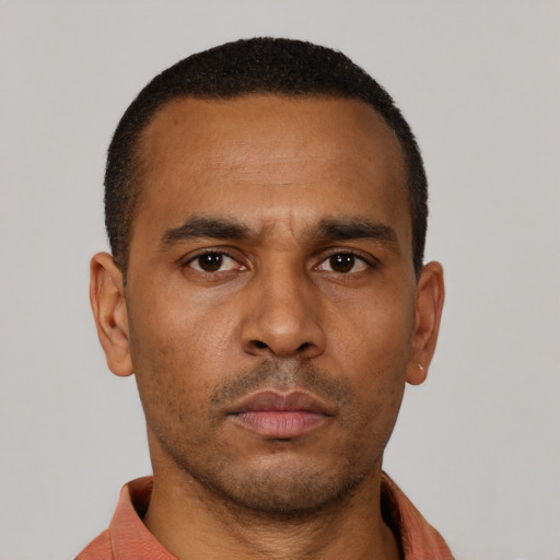 Neutral latino young-adult male with short  brown hair and brown eyes
