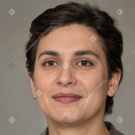 Joyful white adult female with short  brown hair and brown eyes