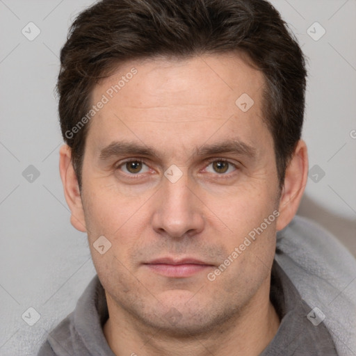 Neutral white adult male with short  brown hair and brown eyes