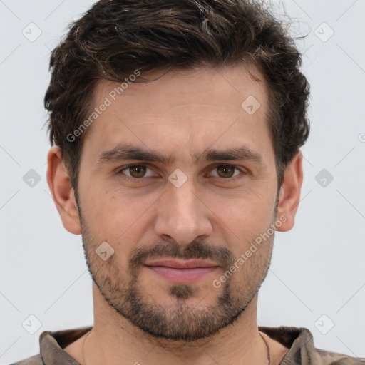 Joyful white adult male with short  brown hair and brown eyes