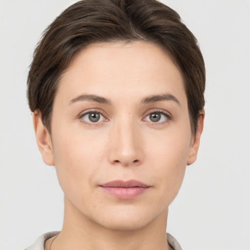 Neutral white young-adult female with short  brown hair and brown eyes