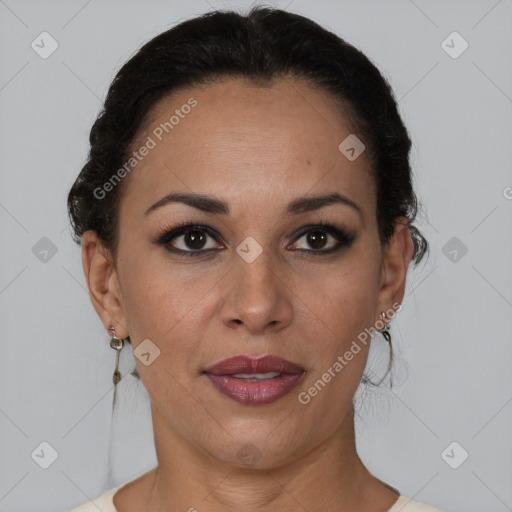 Joyful latino adult female with short  brown hair and brown eyes