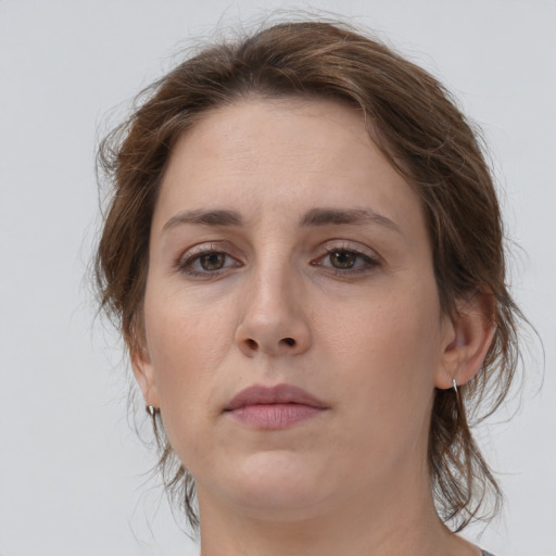 Neutral white young-adult female with medium  brown hair and brown eyes